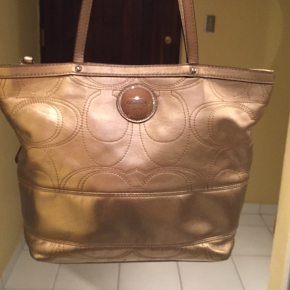 Coach gold handbag