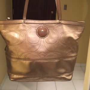 Coach gold handbag