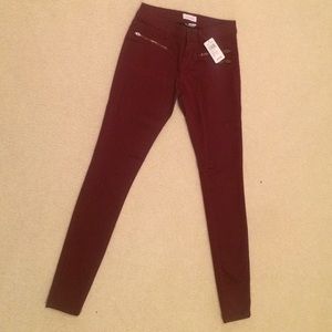 burgundy colored jeans