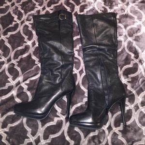Black knee-high leather boots