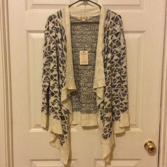 Beautiful brand-new asymmetrical sweater