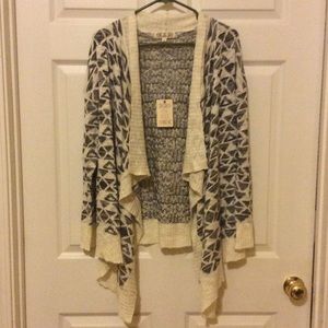 Beautiful brand-new asymmetrical sweater