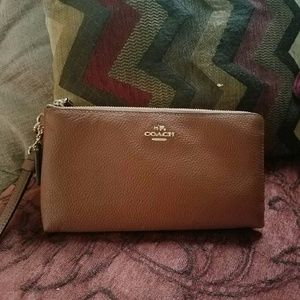 Coach wallet / wristlet gold hardware.