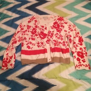 red white and tan cardigan