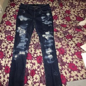 Distressed washed jeans