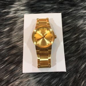 Nixon cannon gold watch