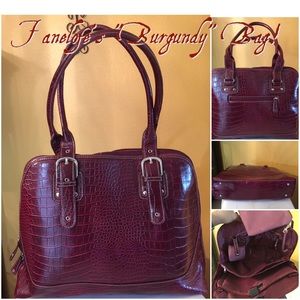 Women's Burgundy mock crock professional bag.