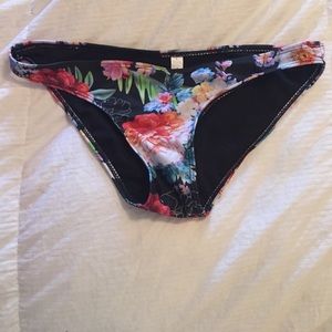 Floral and black bathing suit bottoms