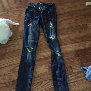 Garage dark washed ripped jeans