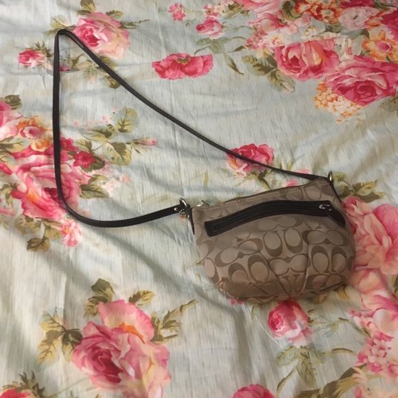 Coach signature logo purse.