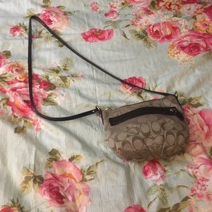 Coach signature logo purse.