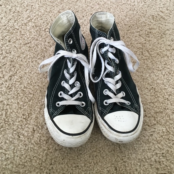 Black and white hi top converse