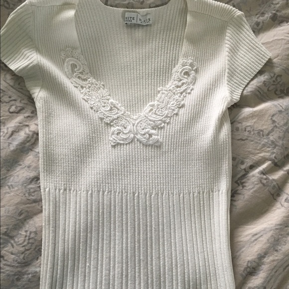 Cream colored knit top
