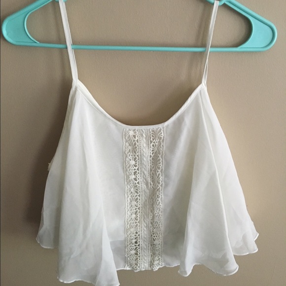 White cropped flowy tank top. Very cute!
