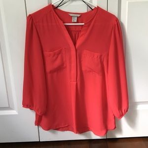 Red flowy blouse