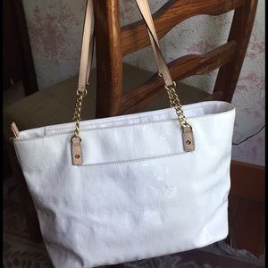 White Michael Kors shoulder bag.
