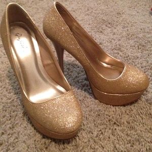 Sparkly gold high heels
