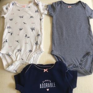 Three 6-month Carters Onsies