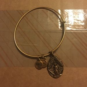 Never worn "Guardian of peace" gold Alex & Ani