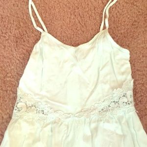 Mint green dress with lace cut out in middle!