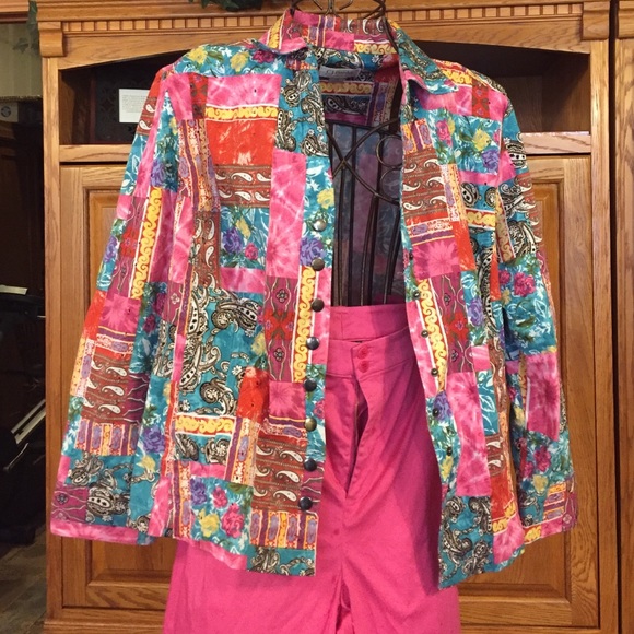 Pink, blue, and yellow jacket with pink pants.