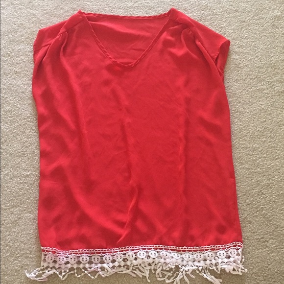 Francesca's red blouse