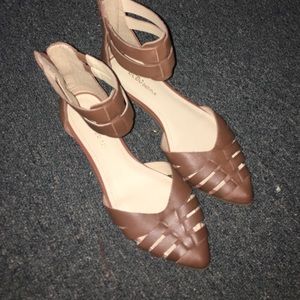tan flats with zip back and ankle strap