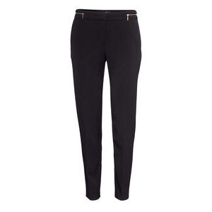 Fitted black slacks with gold zippers