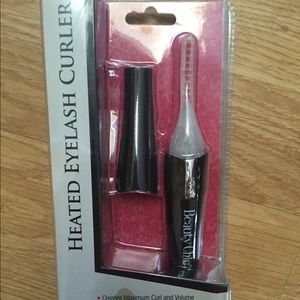 Heated eyelash curler