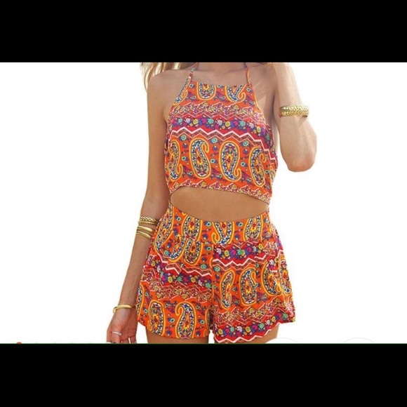 A romper with open back and halter top