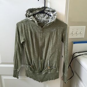 Maurice's green hoodie