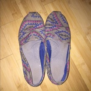 grey TOMS with blue and pink pattern