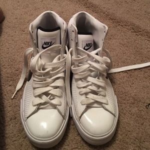 Black and white nike high tops
