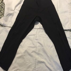 Lululemon black pants with sheer side panels