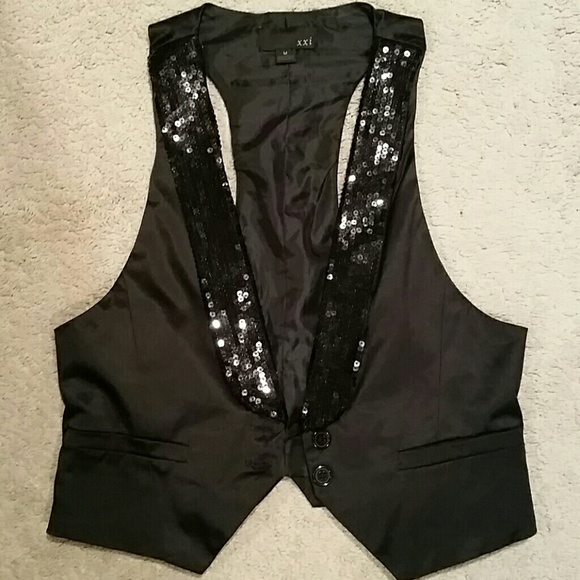 Black sequin vest. GREAT for holiday parties!!!