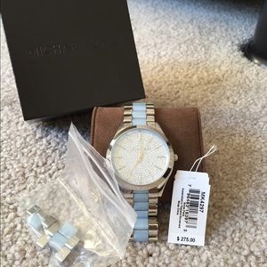 Michael Kors silver watch with blue accent color