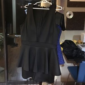 Forever 21+ size black romper suit very low-cut