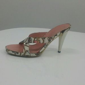 Two Gucci high heel sandals