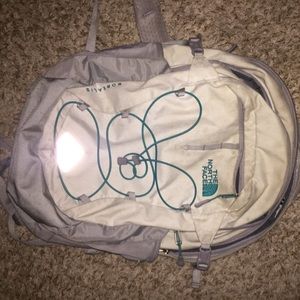 North face white & blue backpack.