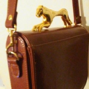 SASHA 1996 BROWN GOLD COUGAR