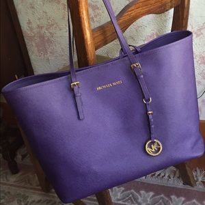 Purple Michael Kors tote.