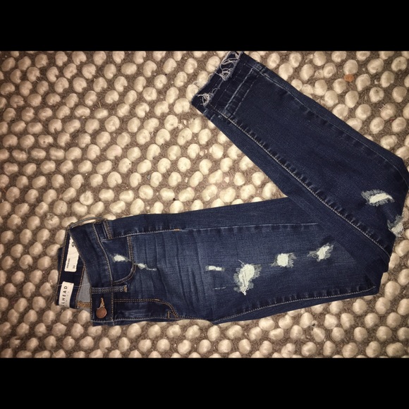 dark blue distressed skinny jeans