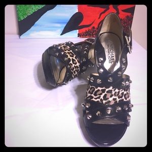 Micheal Kors cheetah print - upper leather heels.