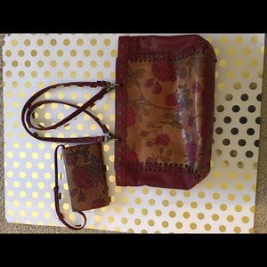 Italian leather handbag with matching wallet.