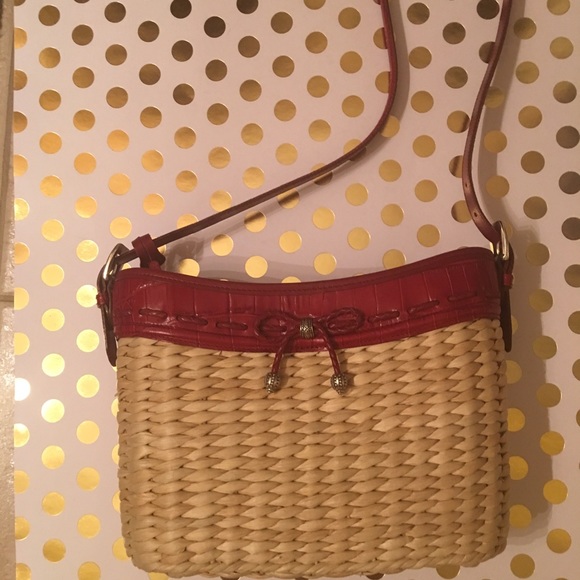 Brighton red trimmed large straw handbag.