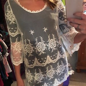 Lace fair trade dress that fits like a medium--