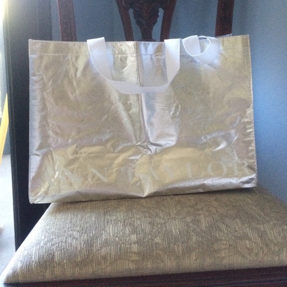 Bran new Ann Taylor (silver) bag.