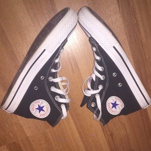 NEVER WORN black high top converse