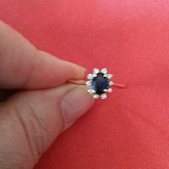 Blue sapphire with diamonds ring