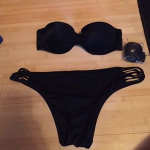 VS black strapless bikini and strappy bottoms